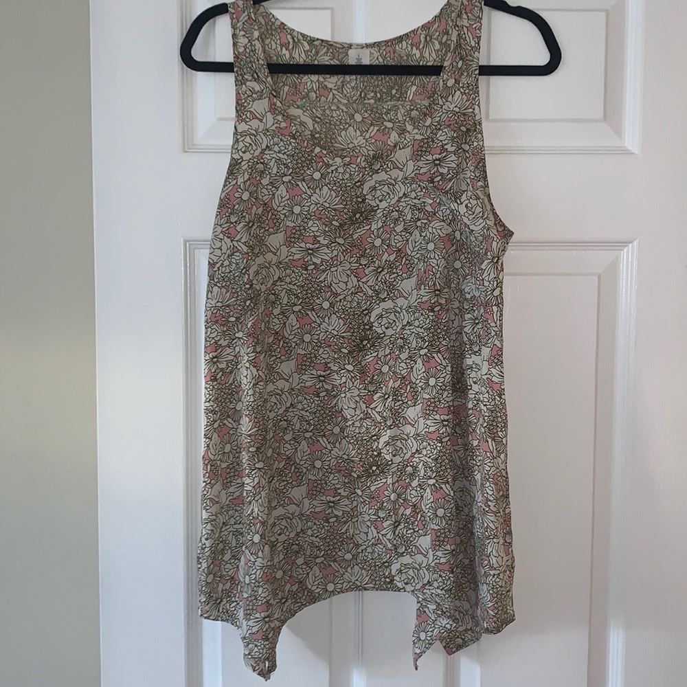 A symmetrical on the sides tank top. Pink, olive green, and white.